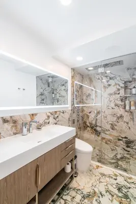 a bathroom with a sink and a toilet at Eden, dream high-end home in NYC in New York