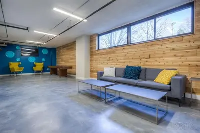 a living room with a couch and some chairs at Avenue A310 Furnished 2br With Pool And Gym in Philadelphia