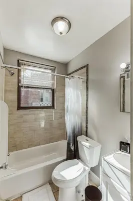 a bathroom with a toilet and a tub and a sink at Lennox C201 Furnished Studio ATT Students in Philadelphia