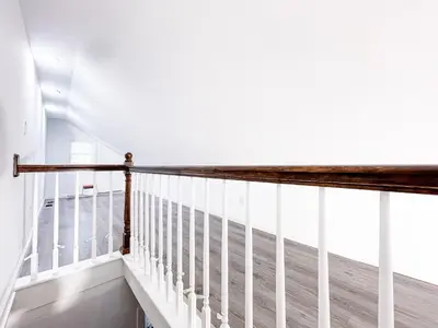 a balcony on a cruise ship with white railing at Cheerful & Modern Home w/ a Walkout Deck Area in Glenside
