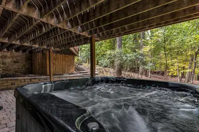 a hot tub in the middle of a house at Star Gazer Luxury A-Frame Wood Cabin. Near York/Harrisburg/Hershey/Lancaster in Goldsboro