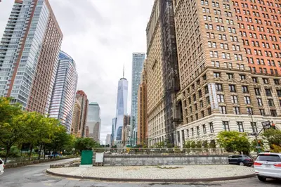 a view of a city with tall buildings at FiDi 2BR w Elevator Gym Doorman nr Wall St NYC-661 in New York