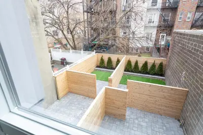 a view of a patio from a window at Modern 3BR Lofts with Outdoor Space Near NYC in Hoboken