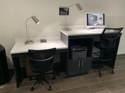 an office with a desk with a computer and two chairs at Best Western Plus Clarks Summit Scranton Hotel in Clarks Summit