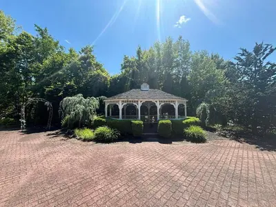 a gazebo in the middle of a brick yard at Best Western Plus Clarks Summit Scranton Hotel in Clarks Summit