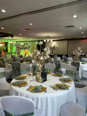 a banquet room with white tables and white chairs at Best Western Plus Clarks Summit Scranton Hotel in Clarks Summit