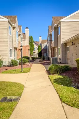 a sidewalk in front of a row of houses at Philadelphia Suites at Airport - An Extended Stay Hotel in Philadelphia