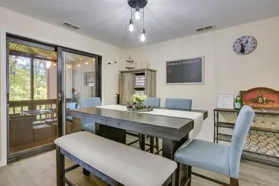 a dining room with a table and chairs at Ski-InandSki-Out! Mountain Creek Resort Condo in Vernon Township
