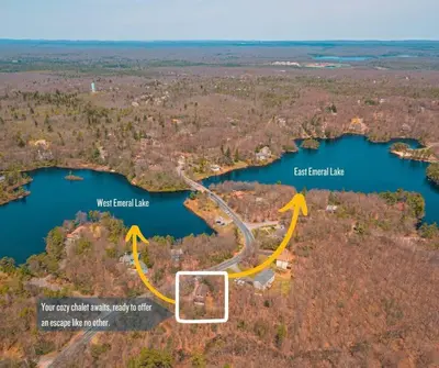 an aerial view of a river with arrows pointing to the left at Cheerful Chalet - Fireplace, BBQ, Firepit& Hottub in Long Pond