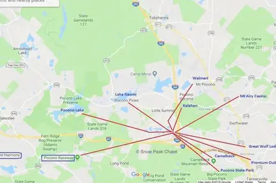 a map with red arrows pointing to cities at PoconoChalet-Hot Tub-Grill-Firepit-Games in Long Pond