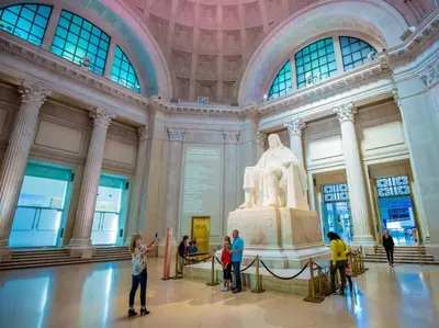 a group of people looking at a statue in a museum at Center City Philadelphia 1BR Apartment Sleeps 4, Walk to Attractions in Philadelphia