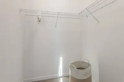 a bucket sitting on the floor in a room at Beautiful 3bedroom apartment in Elizabeth