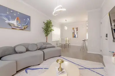 a living room with a couch and a table at Beautiful 3bedroom apartment in Elizabeth