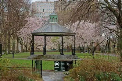 a gazebo in the middle of a park at Newly Renovated 2BR w Rare Private Backyard and BBQ in New York
