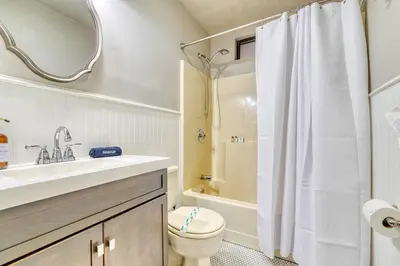 a bathroom with a toilet and a sink and a shower at Antler Ridge: 3BDR w Hot Tub & Game Room in Albrightsville