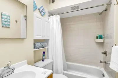 a bathroom with a tub and a sink and a toilet at Stylish 1BR Prime Location in Philadelphia