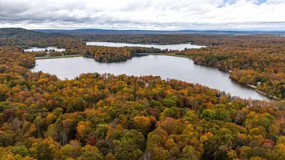 an aerial view of a river in the fall at Hot Tub Fire Pit Dog Friendly in Pocono Lake
