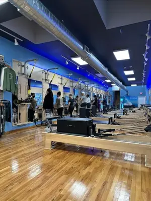 a room with rows of tables with people in it at Starlight Guesthouse in West Orange