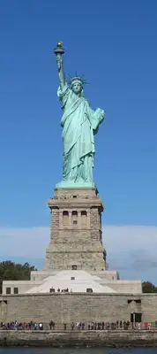a statue of liberty with a group of people standing around it at Modern one bedroom apartment in Elizabeth