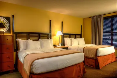 a hotel room with two beds and a window at Bear Creek Mountain Resort in Breinigsville
