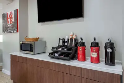 a counter with two fire extinguishers and a microwave at Comfort Inn Philadelphia International Airport West in Chester