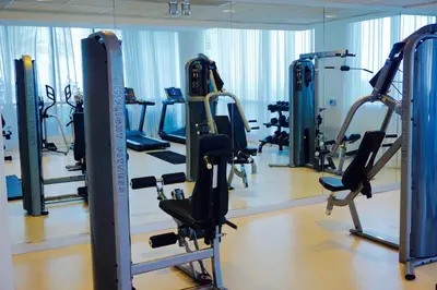 a gym with a bunch of tread machines at Pet Friendly 2 Bedroom and 2 Bathroom Apartment near Rittenhouse apts in Philadelphia