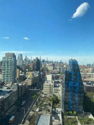 a view of a city with a tall building at LES is MORE stunning views in New York
