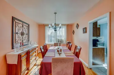 a dining room with a long table and chairs at Quaint Lansdowne Getaway Near Downtown Philly! in Lansdowne