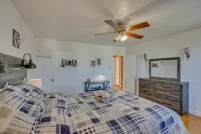 a bedroom with a bed and a ceiling fan at Quaint Lansdowne Getaway Near Downtown Philly! in Lansdowne