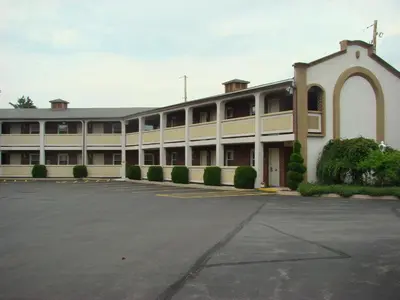 an empty parking lot in front of a building at Aderi Hotel Lewisburg in Lewisburg