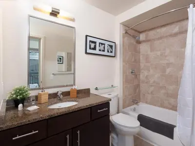a bathroom with a sink and a toilet and a shower at Furnished Apartment near Rittenhouse Square apts in Philadelphia