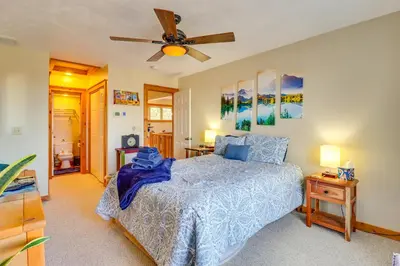 a bedroom with a bed and a ceiling fan at Tannersville Rental Near Camelback Ski Resort! in Tannersville