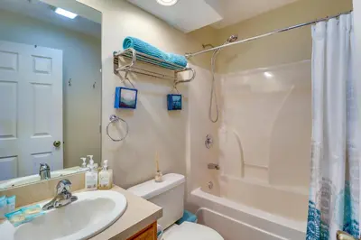 a bathroom with a sink and a toilet and a shower at Tannersville Rental Near Camelback Ski Resort! in Tannersville
