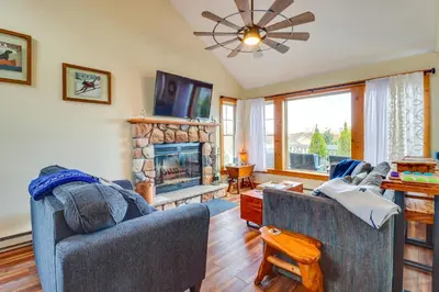 a living room with two couches and a fireplace at Tannersville Rental Near Camelback Ski Resort! in Tannersville