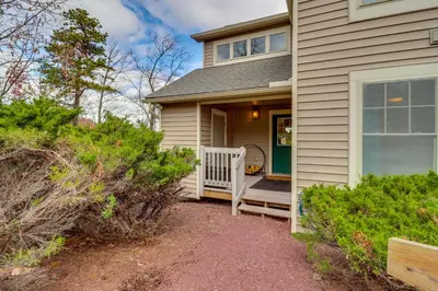 a house with a green door and a porch at Tannersville Rental Near Camelback Ski Resort! in Tannersville