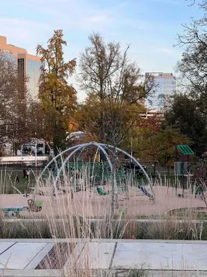 a fountain in the middle of a park at Cozy on the Hill in Wilmington