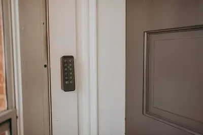 a remote control on the door of a room at 1900's Historic Lancaster School House in Willow Street
