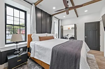 a bedroom with a bed and a window at Riverview in Port Clinton - Apt. B in Port Clinton