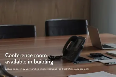 a conference room with a phone on a desk at Financial District 1br w WD gym elevator NYC-1362 in New York