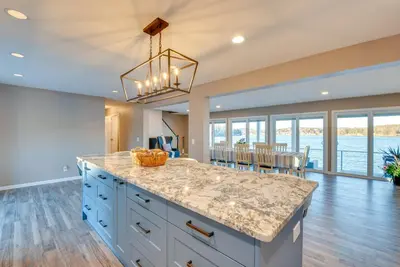 a kitchen with a large island with a counter top at Family Home on Lake Newton with Deck and Fire Pit in Carbondale