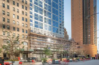 a group of tall buildings in a city at Financial District 1br w WD gym elevator NYC-1378 in New York