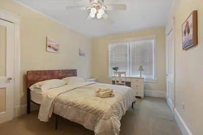 a bedroom with a bed and a ceiling fan at Greenridge Getaway:Near Universities & Attractions in Scranton