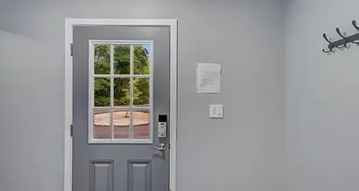 an open door with a window in a house at Peaceful Pocono Home with Hot Tub, gym, & office in Long Pond