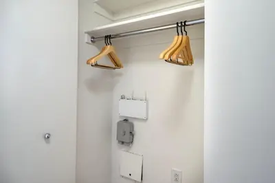 two lights hanging from a wall in a bathroom at Upper West Side 2br w rooftop gym nr park NYC-1216 in New York