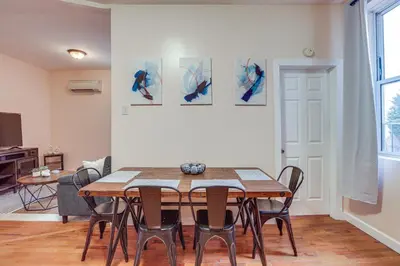 a dining room with a table and chairs at Comfy Bayonne Townhome about 11 Mi to NYC Attractions in Bayonne