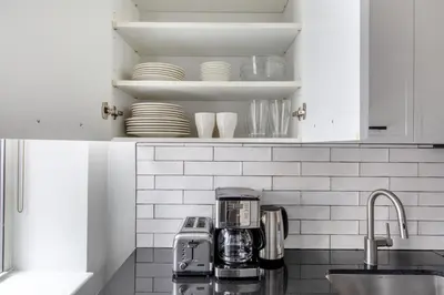 a kitchen with a coffee maker on a counter at FiDi 1br w fitness center nr freedom tower NYC-1340 in New York