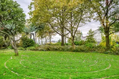 a labyrinth in the grass in a park at FiDi 1br w game room resident-only speakeasy NYC-1346 in New York
