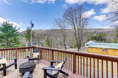 a deck with chairs and a table and chairs at Secluded Kerhonkson Retreat with Deck and Views! in Sundown