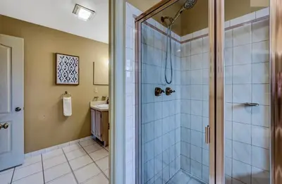 a bathroom with a shower and a sink at Poconos Paradise Lakeskihikewater Parkkids in Lake Harmony