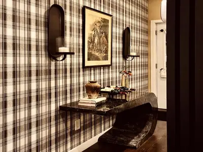 a room with a table with a vase on a wall at Trio Sonata, 3-Bed Rock n Roll Residence in Northern Liberties in Philadelphia